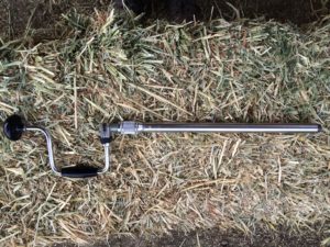 Example of a hand cranked hay probe used for taking samples.